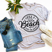 Load image into Gallery viewer, Life’s a Beach Enjoy The Waves T-shirt - Bee and Co
